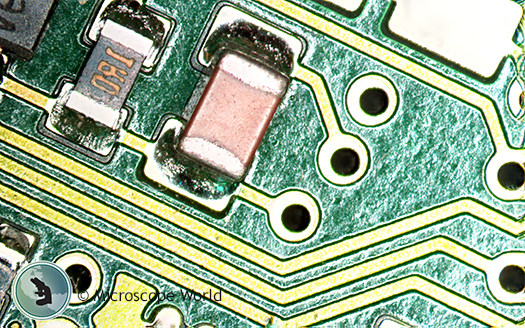 Circuit Board Under stereo Microscope with Polarizing LED Ring Light Circuit Board Under stereo Microscope with Polarizing LED Ring Light